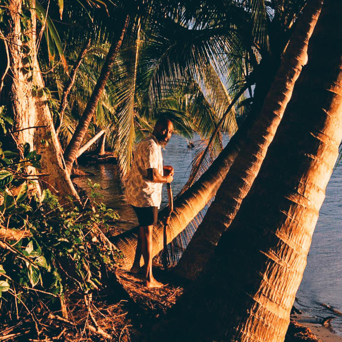 Ariel Stephens, the Bocas Guru, walks through the jungle of Isla Carenero as he acts as a private guide for travel in Bocas del Toro